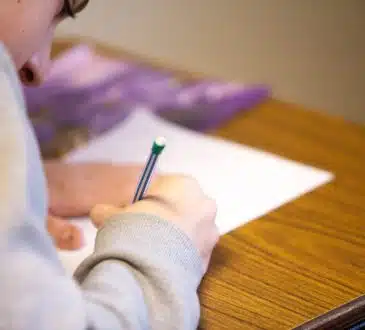 person using pencil