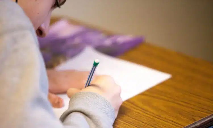 person using pencil